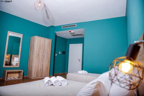 Postel nebo postele na pokoji v ubytování Arc Hotel Tirana
