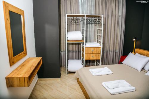 Postel nebo postele na pokoji v ubytování Arc Hotel Tirana