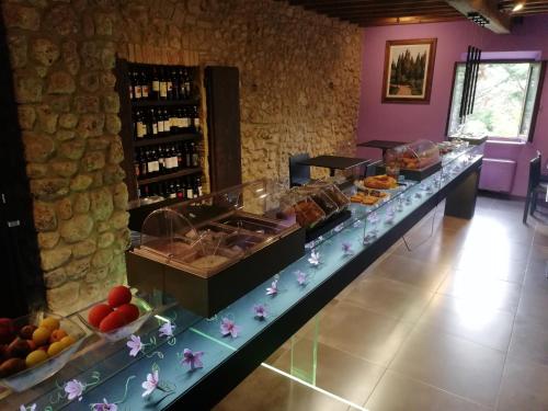 a buffet line with various food items on display at Casanova di Pescille in San Gimignano