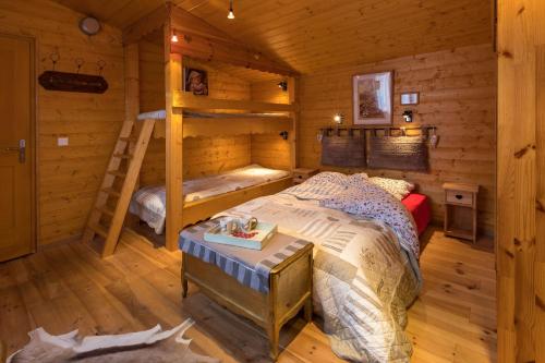 เตียงในห้องที่ Gite&Spa le Montagnard
