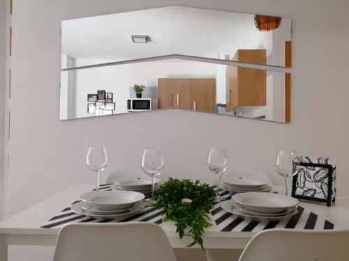 A kitchen or kitchenette at Apartamento La Victoria