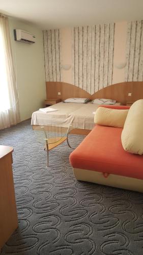 Guest House Orchidea tesisinde bir odada yatak veya yataklar