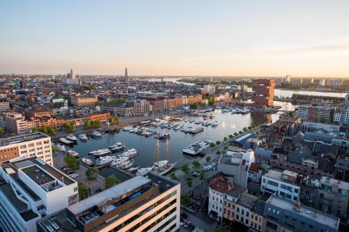 an aerial view of a city with boats in the water at Exclusieve privé wellness penthouse SkyNooz in Antwerp