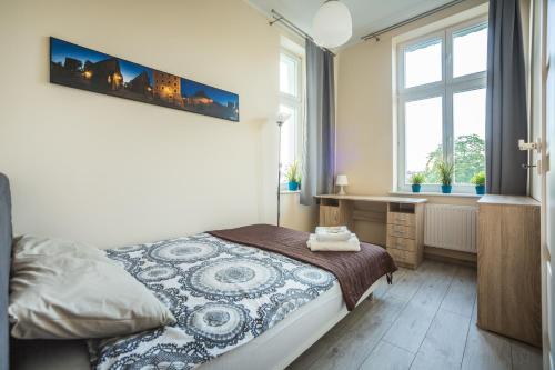 Katil atau katil-katil dalam bilik di Rest & Chill Apartment