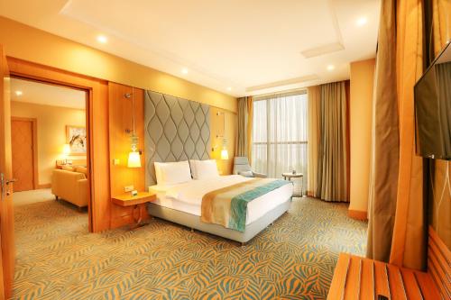 TRYP by Wyndham Izmitにあるベッド