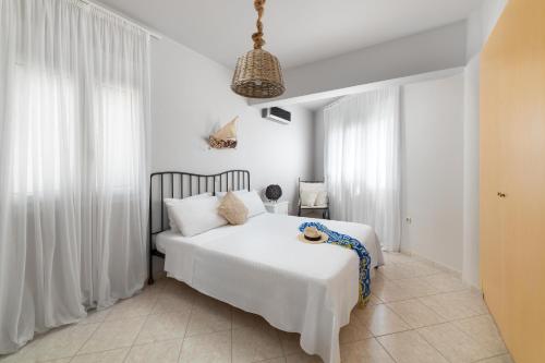 Photo de la galerie de l'établissement Haraki Hill & Seaview - Aelia Apartment, à Haraki