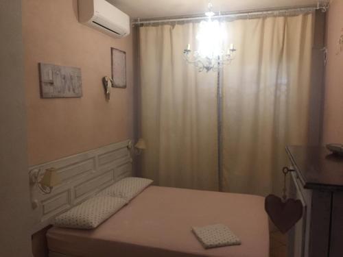 Posteľ alebo postele v izbe v ubytovaní Loft a pochi passi dal mare