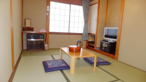 Kjøkken eller kjøkkenkrok på Minshuku Iwatakan
