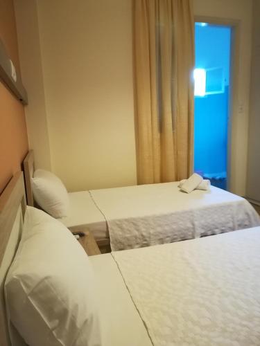 Katil atau katil-katil dalam bilik di Stella Rooms