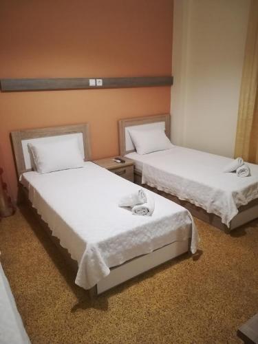 Katil atau katil-katil dalam bilik di Stella Rooms