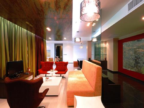 The Zign Hotelにあるテレビまたはエンターテインメントセンター