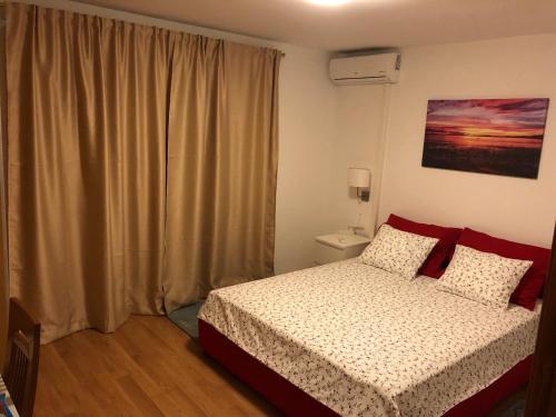 מיטה או מיטות בחדר ב-Apartments Volarevic
