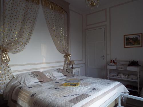 Ένα ή περισσότερα κρεβάτια σε δωμάτιο στο Villa Tranquillité