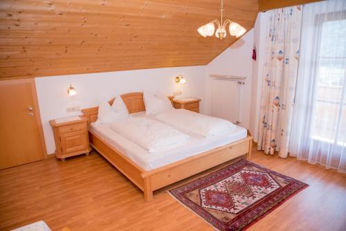 Un pat sau paturi într-o cameră la Stegerhof