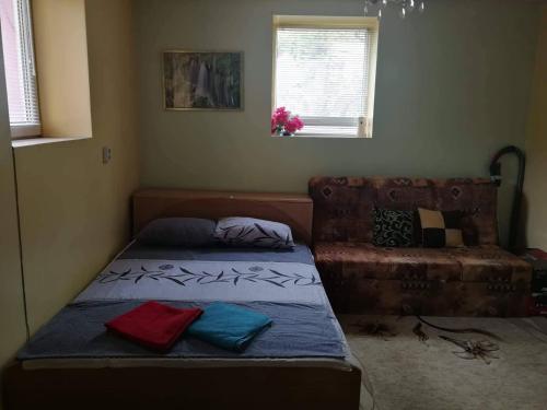 Postel nebo postele na pokoji v ubytování Two Bedroom Townhouse Mika