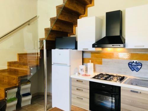 Kuchyň nebo kuchyňský kout v ubytování Simone Home