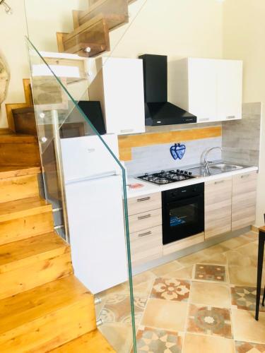 Kuchyň nebo kuchyňský kout v ubytování Simone Home