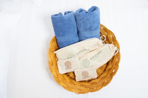 a basket filled with blue and white socks at Vintage Suites in Limenaria