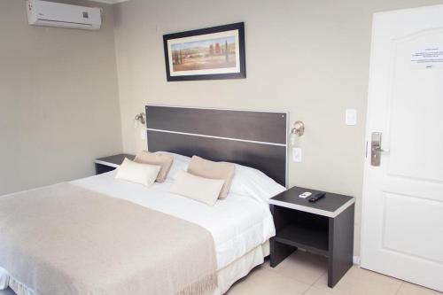 Postel nebo postele na pokoji v ubytování Costa Del Sol