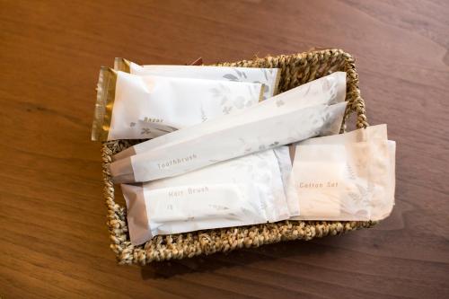 a basket filled with white papers on a table at PINN-N4E2Ⅰ in Sapporo