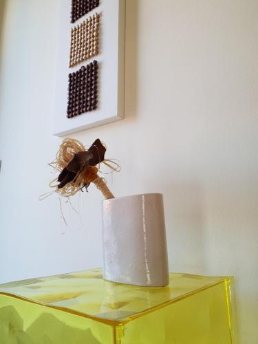 a spider sitting on top of a yellow table at Villa Mara in Riccò del Golfo di Spezia