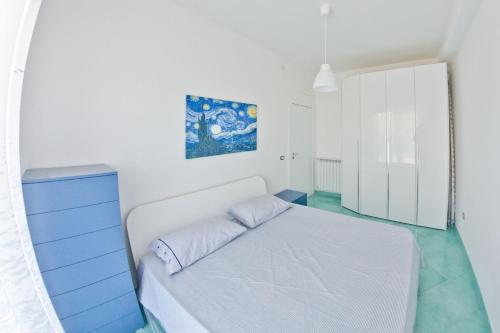 Postel nebo postele na pokoji v ubytování Scauri resort