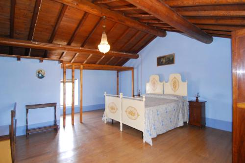A bed or beds in a room at Antica Dimora dell'Ortolano