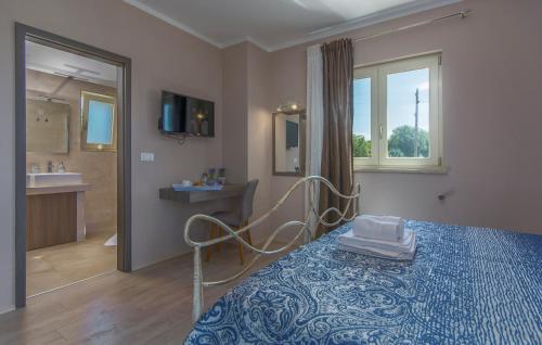 Postel nebo postele na pokoji v ubytování Villa Contessa