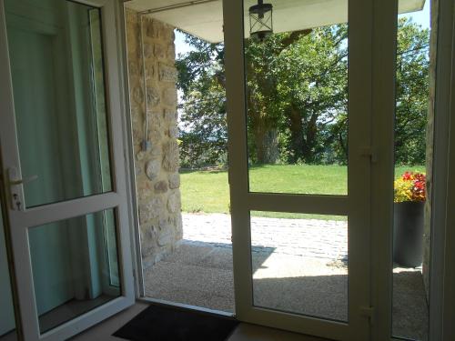 Κήπος έξω από το Maison d'Hotes Les Palmiers