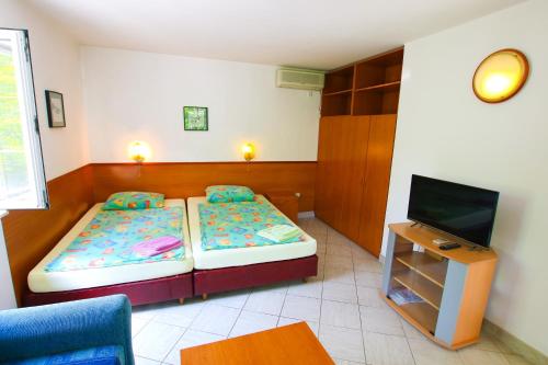 Guest House Sagaにあるベッド