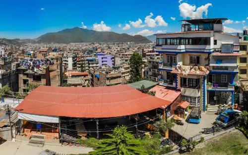 an overhead view of a city with buildings at Wander Thirst in Kathmandu
