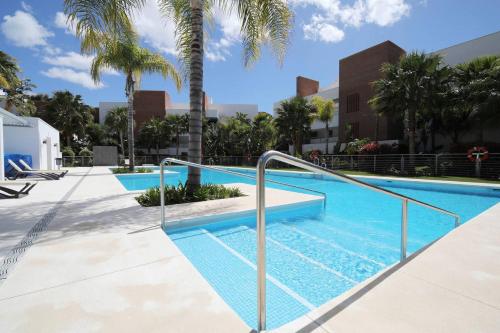 The swimming pool at or close to Luxury Flat -Sea, Golf and Mountain Views