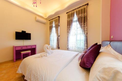 Ein Bett oder Betten in einem Zimmer der Unterkunft Hasayaki Homestay