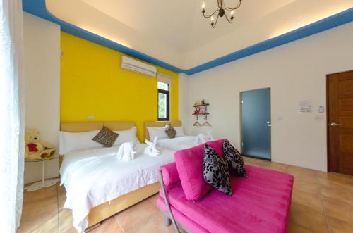 Ein Bett oder Betten in einem Zimmer der Unterkunft Hasayaki Homestay