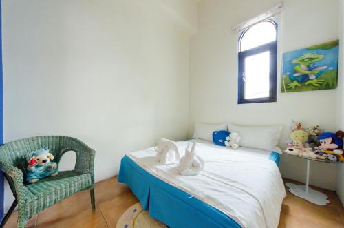 Ein Bett oder Betten in einem Zimmer der Unterkunft Hasayaki Homestay