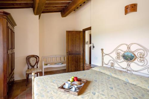 Tempat tidur dalam kamar di PanElios Borgo Vacanze