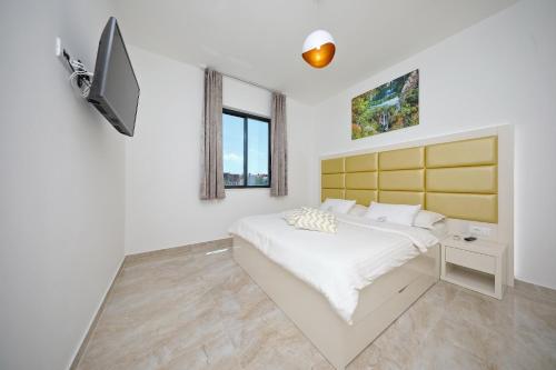 Katil atau katil-katil dalam bilik di Apartments Dalmatia Infinity