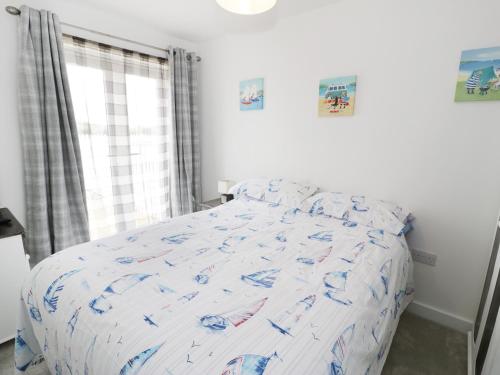 Una cama o camas en una habitación de Welymora
