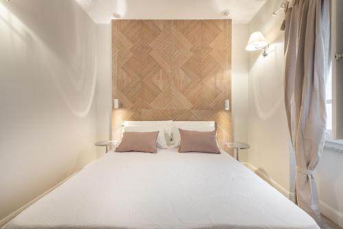 AQUAMADRE Suitesにあるベッド