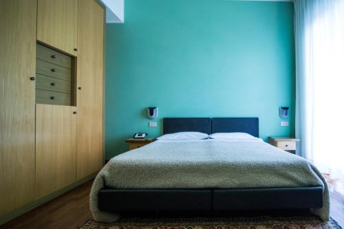 Een bed of bedden in een kamer bij Hotel San Giacomo