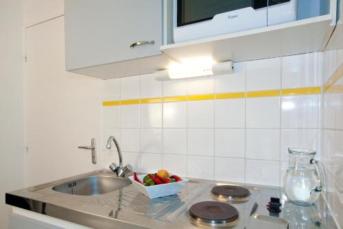 A cozinha ou cozinha compacta de Cerise Lannion