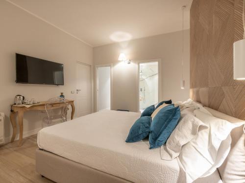 AQUAMADRE Suitesにあるベッド