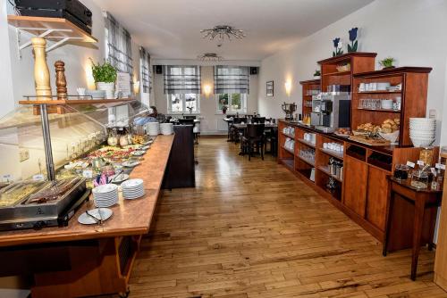 Kuchyň nebo kuchyňský kout v ubytování Hotel Stadt Hamburg