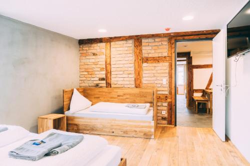 Letto o letti in una camera di Amtshaus Gut Hügle Boutique Apartments