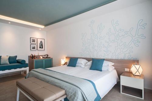 Postel nebo postele na pokoji v ubytování Modica Beach Resort