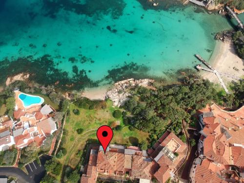 an aerial view of a property with a red marker at LUX-Porto Cervo Center Sea View Apartment in Porto Cervo