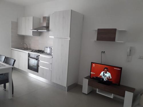 Η κουζίνα ή μικρή κουζίνα στο Casa Vacanze Buria