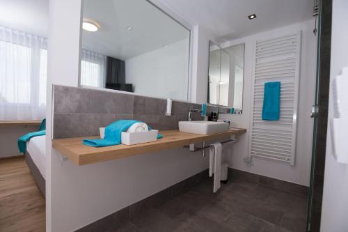 Postel nebo postele na pokoji v ubytování motel isar | 24h/7 checkin