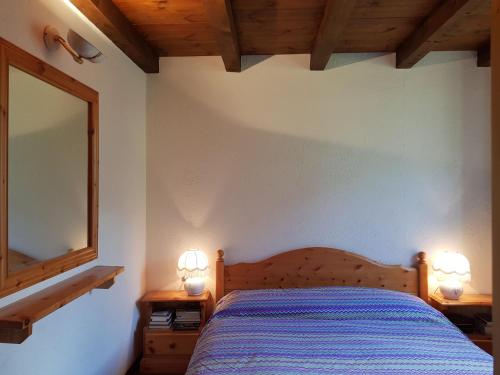 Postel nebo postele na pokoji v ubytování L'Atelier du Temps - La Belle Vue