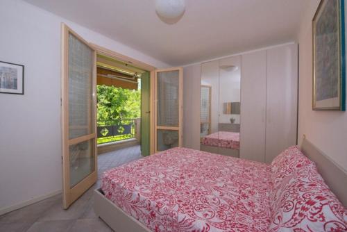Posteľ alebo postele v izbe v ubytovaní Luxury apartment Garda Lake